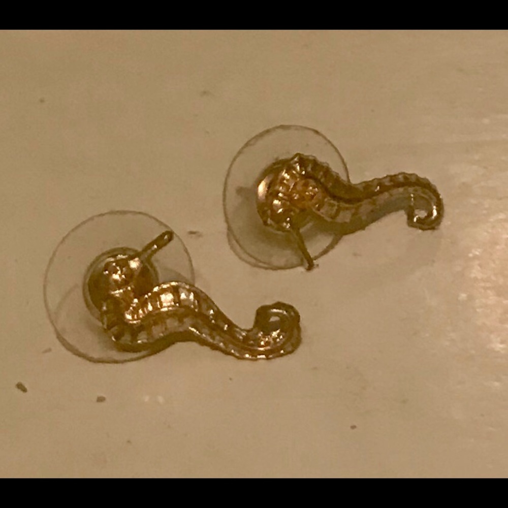 gold seahorse earrings with cubic zirconia eyes